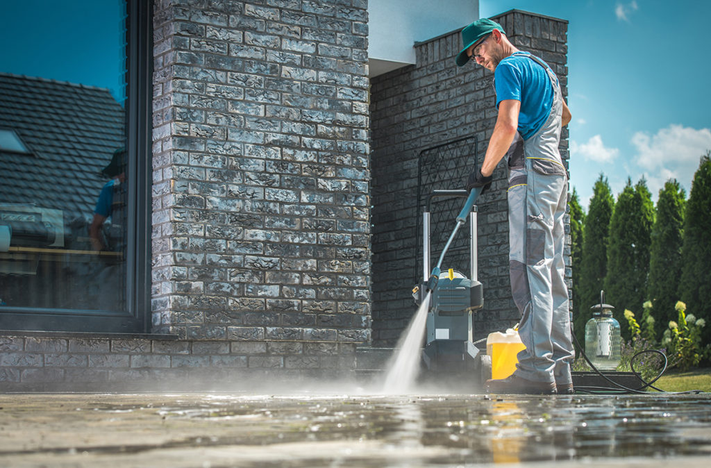 cleaning pathways for safety with a pressure washer
